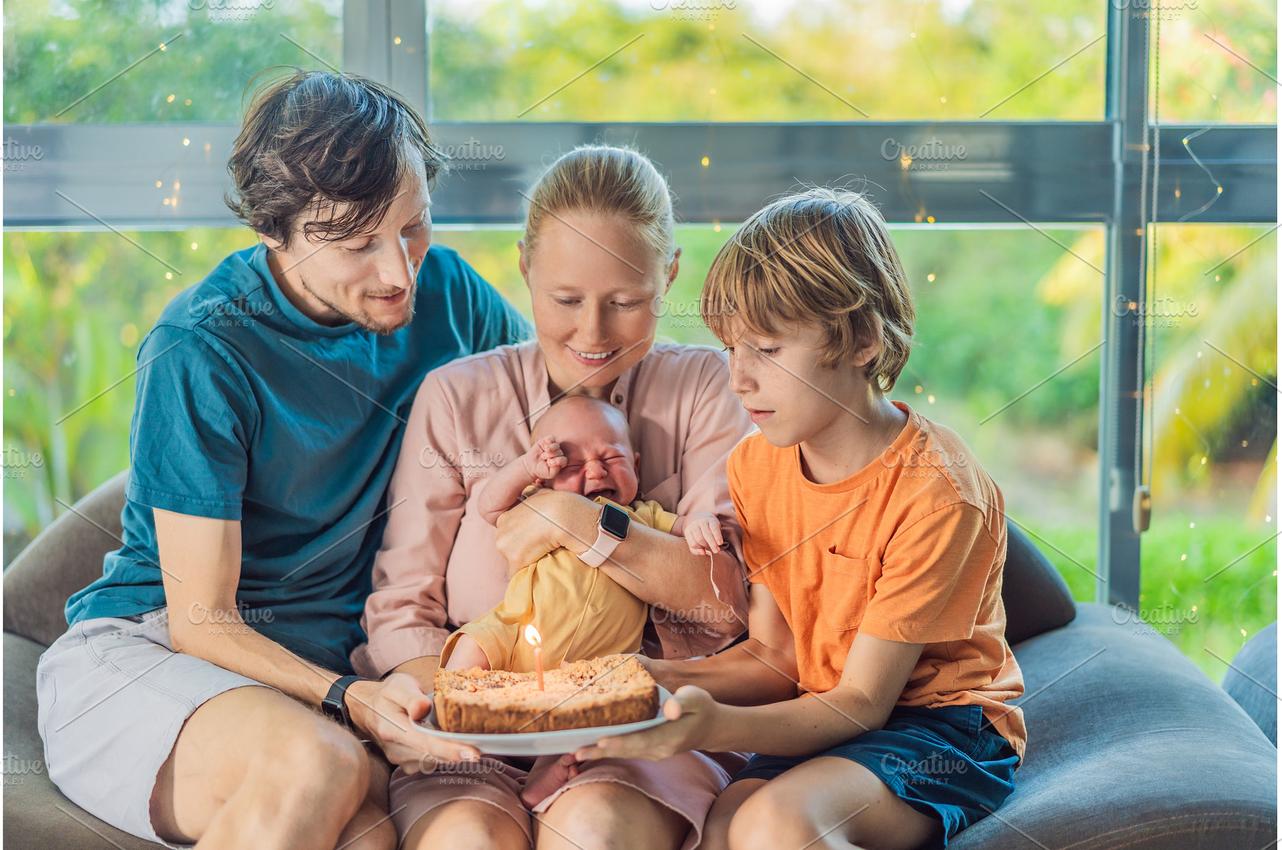 Happy family celebrating their, a Person Photo by Elizaveta Galitskaya