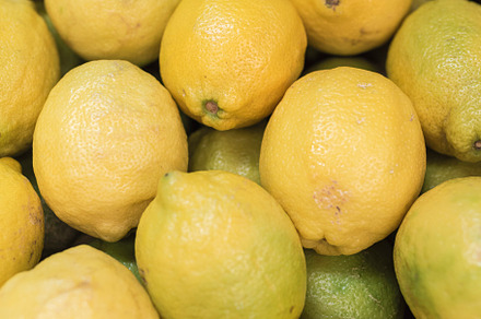 A pile of lemons in a box, a Food & Drink Photo by YossSabalet