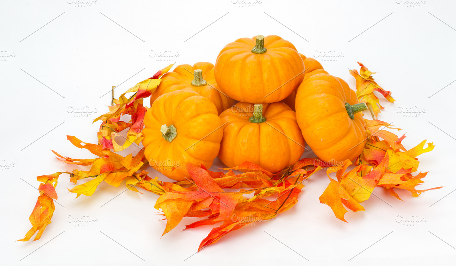 Fall decorations with leaves containing fall, autumn, and harvest