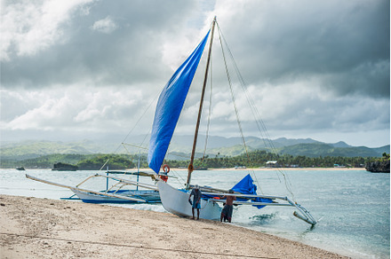 Filipino boat in the sea near the, a Nature Photo by Elizaveta Galitskaya