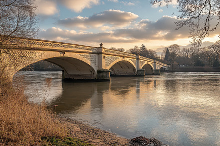 Serene view of Kew Bridge at sunset, a Photo by Iftikhar Alam