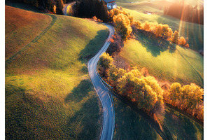 Aerial view of road in alpine, a Transportation Photo by den-belitsky