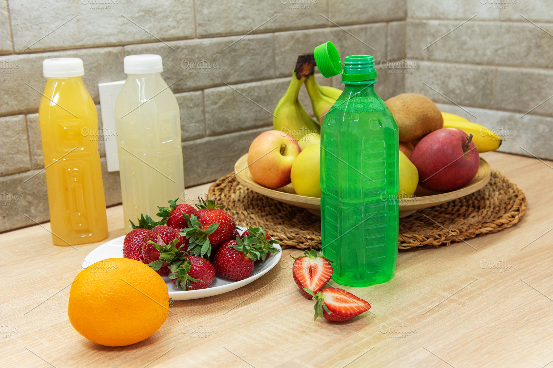 Fresh fruit juice bottles and healthy raw fruits, a Food & Drink Photo by Olena Rudo