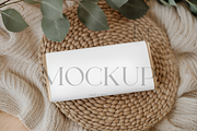 Chocolate Bar Mockup on Woven Basket, a Product Mockup by TatiMockup (Thumbnail 1 of 4)