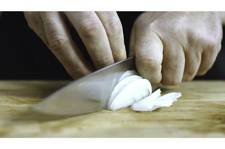 Close-up of man hands cutting white, a Food & Drink Photo by Media Whale Stock