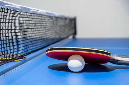 Closeup red table tennis paddle whit stock photo containing ping pong and, a Sports & Recreation Photo by yongkiet jitwattanatam