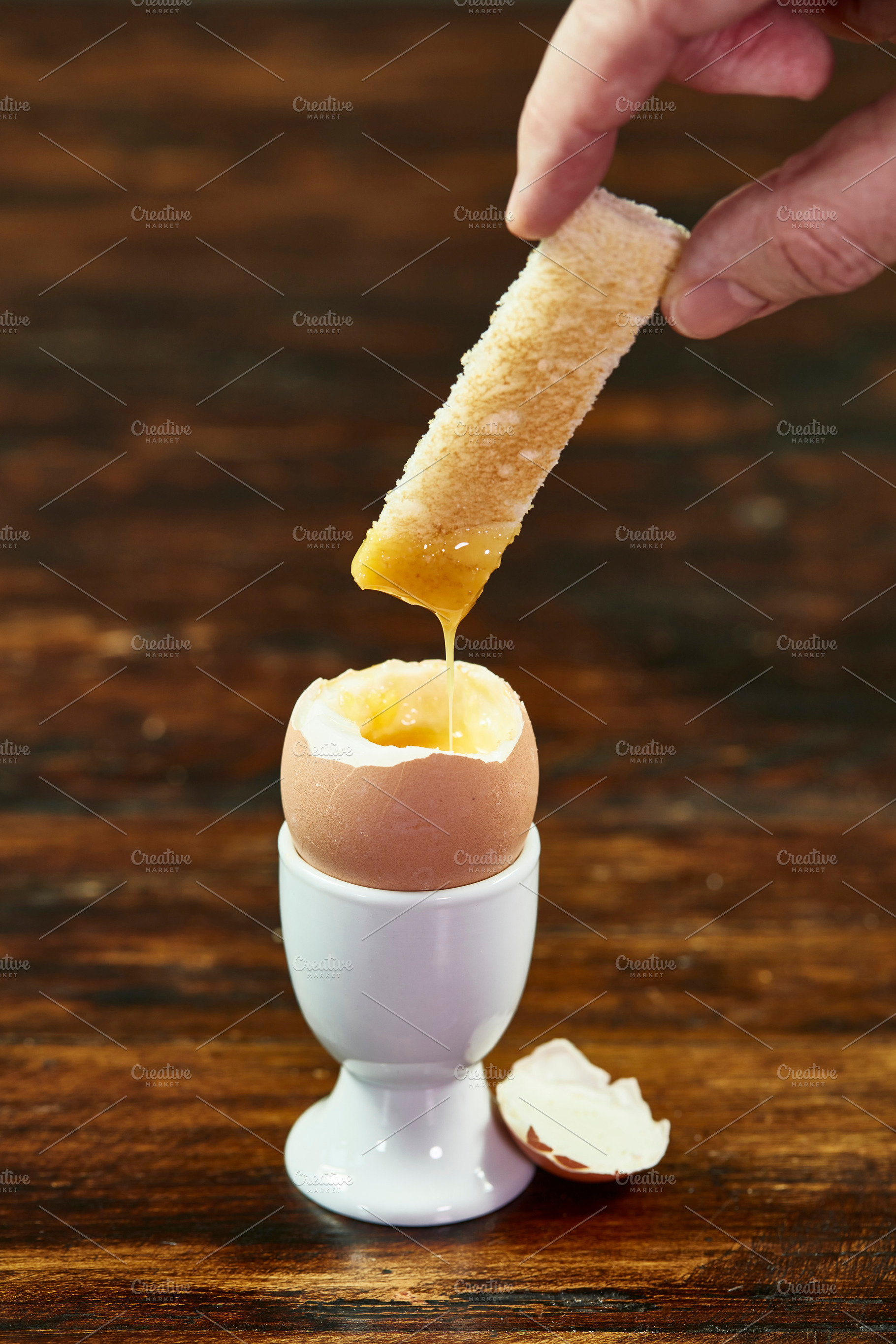 Hand Dipping Toast In Egg, a Food & Drink Photo by Photos from the Heart