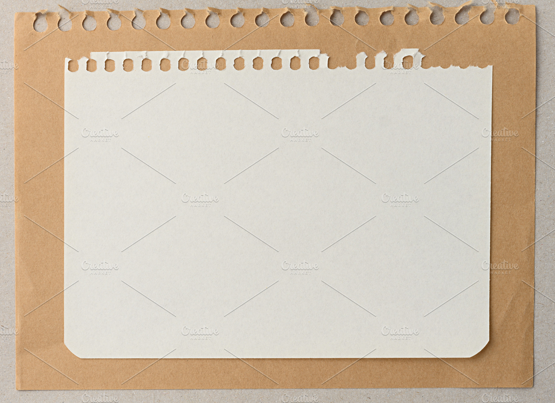 A blank white sheet of paper with a perforated edge lies on a br, an Abstract Photo by ndanko