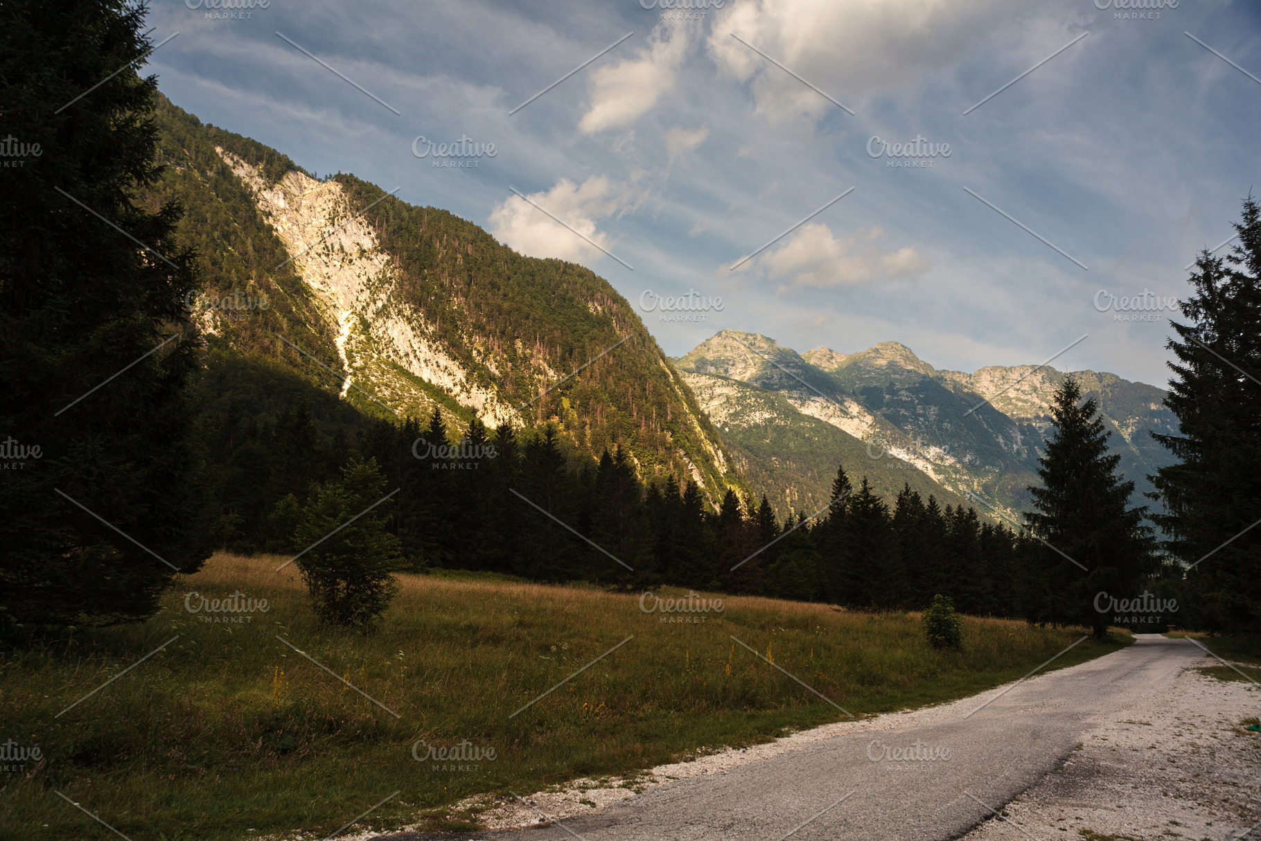Sun rays or god rays over the Julian Alps in Slovenia, a Nature Photo by Bepslabor