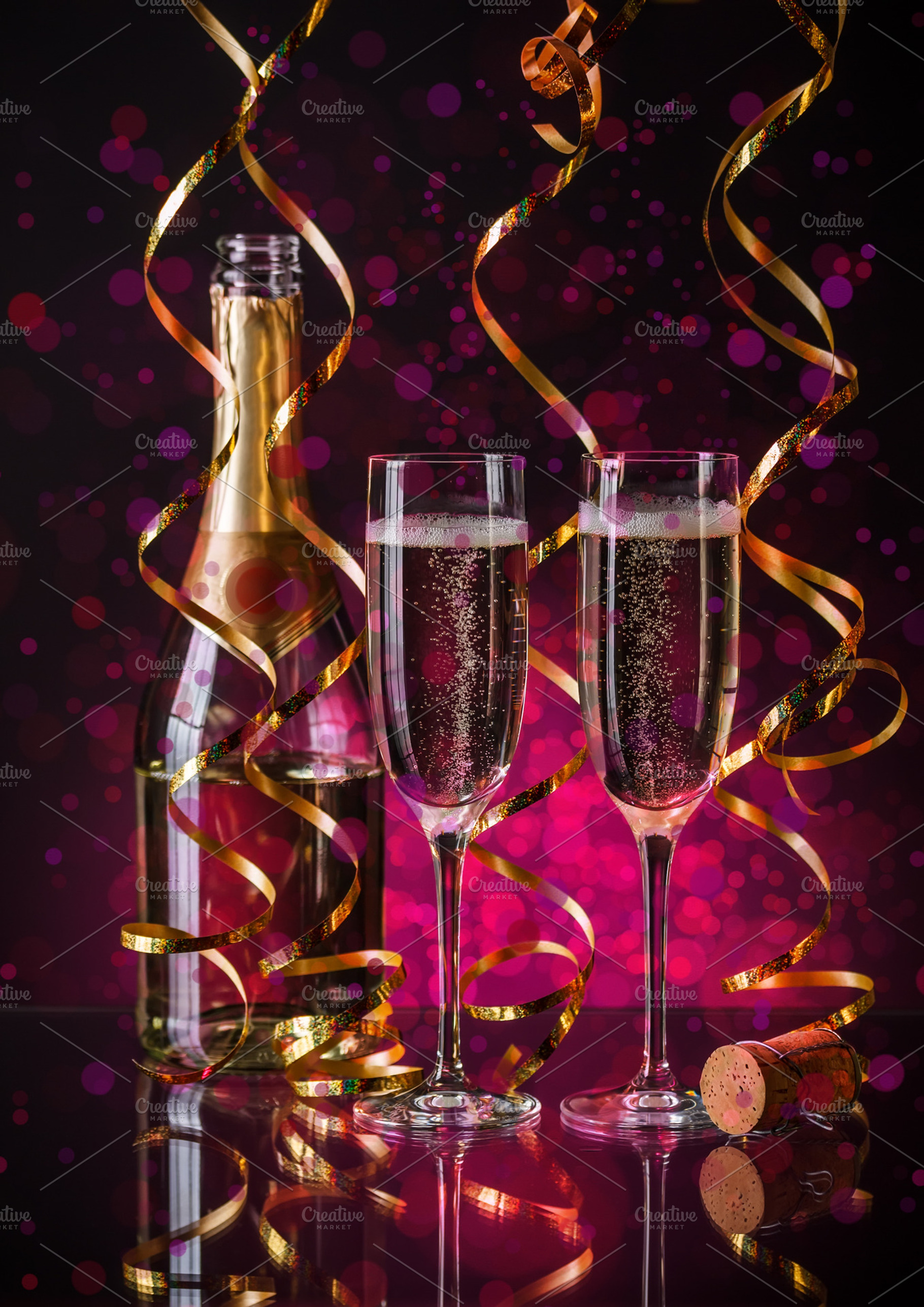 Two champagner glasses featuring drink, toast, and holiday
