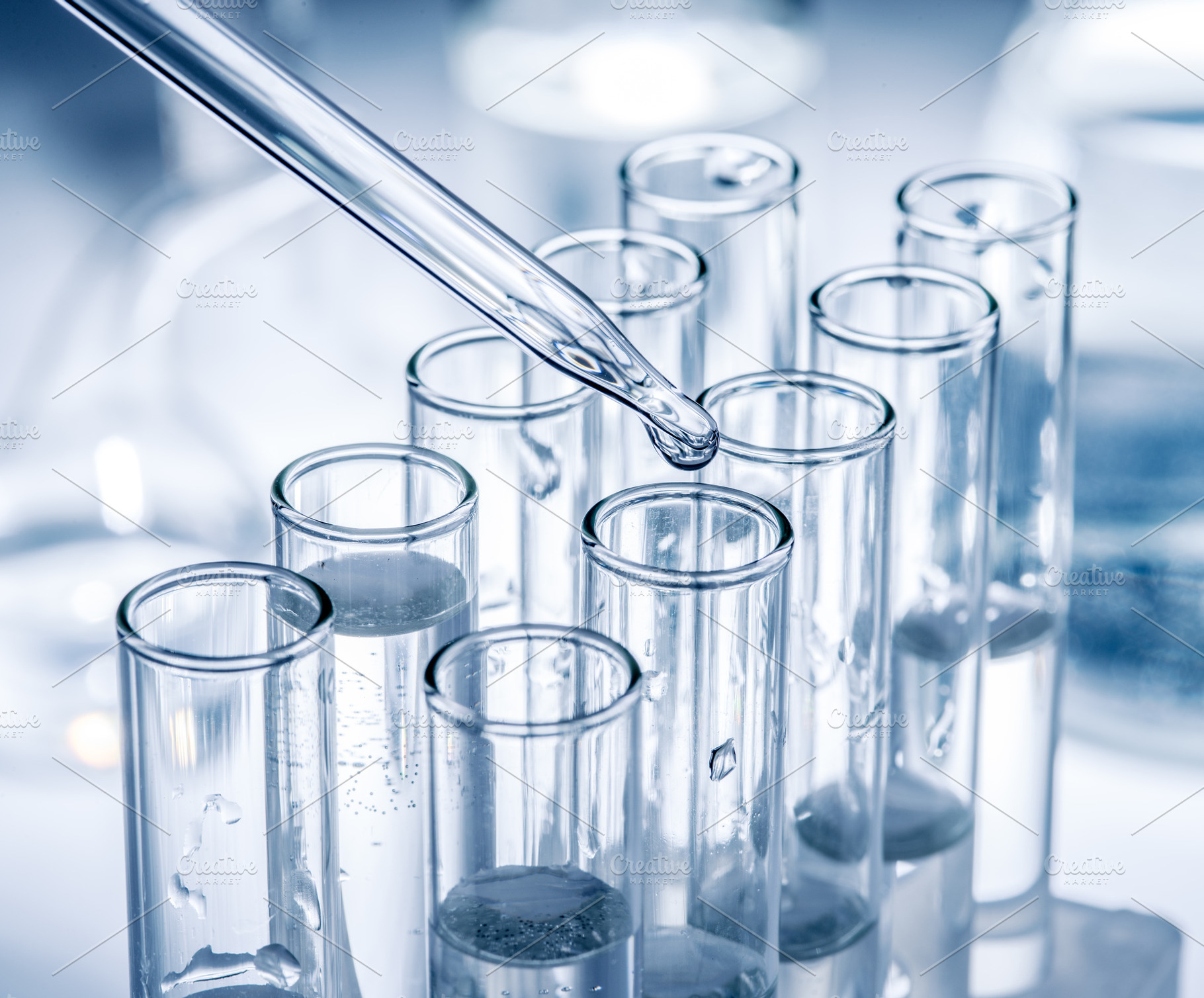 Different laboratory beakers and glassware., an Industrial Photo by Volff