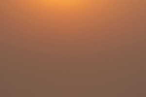 Minimalist golden sunset over calm sea with lonely boat and sky, a Photo by Pictures for you!!!!!!!!!