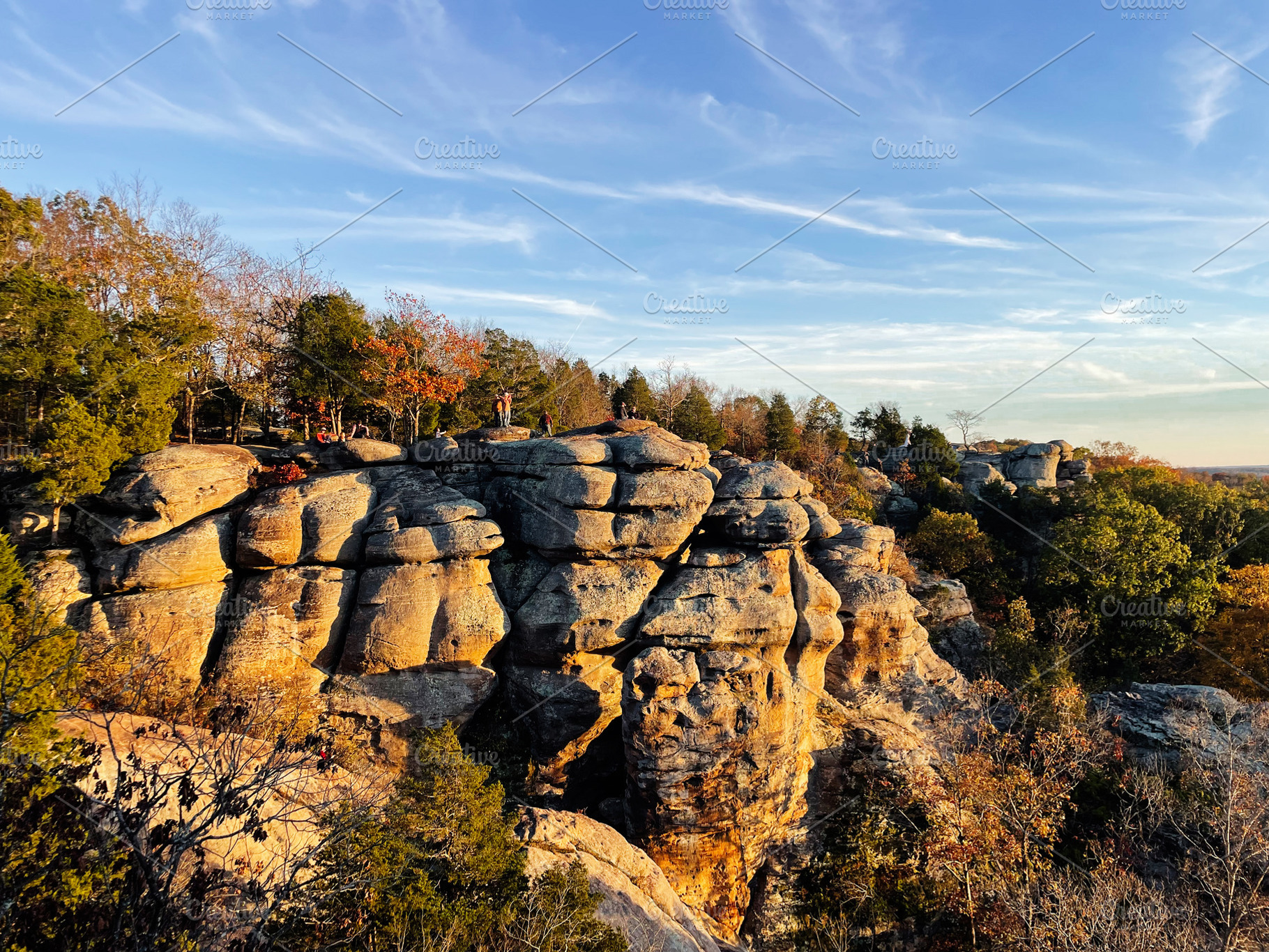 People explore towering sandstone rock formations at Garden of the Gods in Colo, a Nature Photo by AS photostudio
