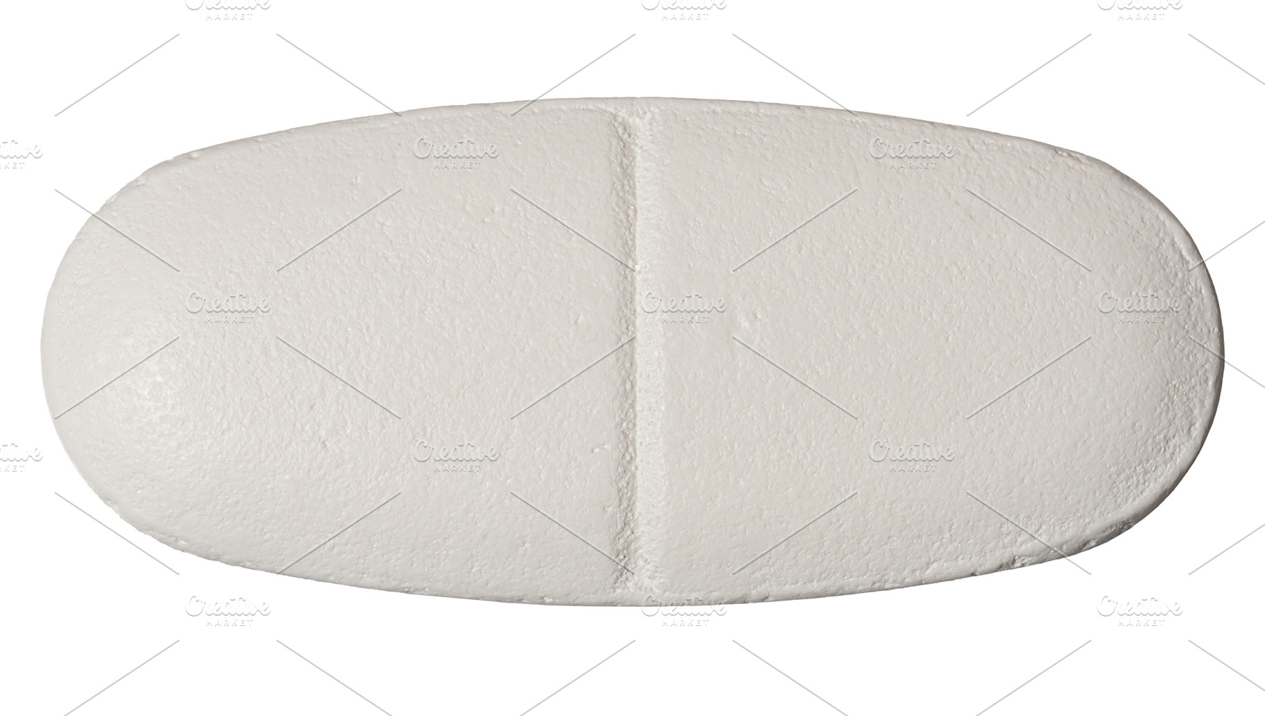 Close-up of a white oval tablet with a score line, isolated back, a Health & Medical Photo by ndanko