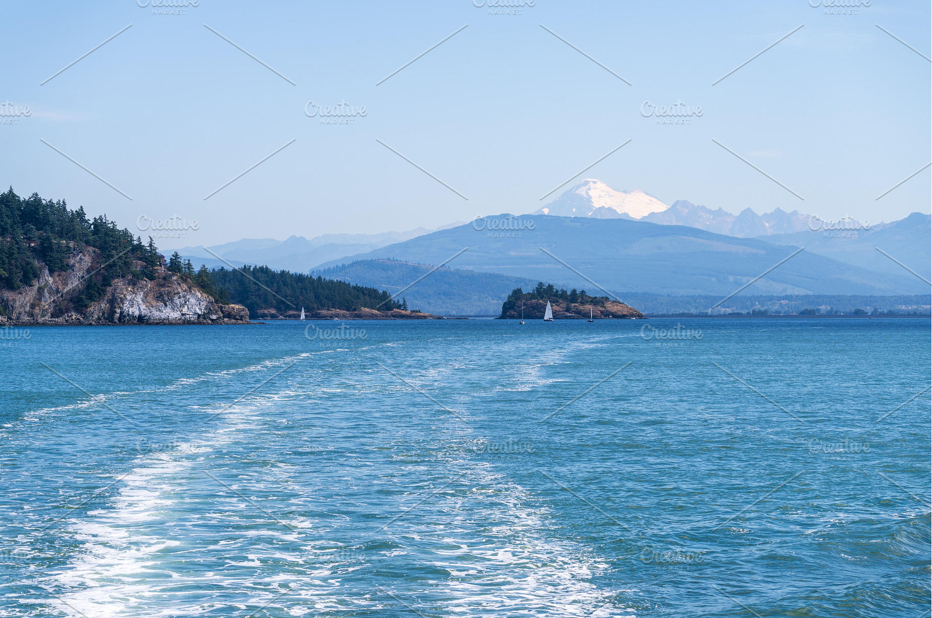 Shades of blue with Mt Baker in, a Nature Photo by Backyard Stock