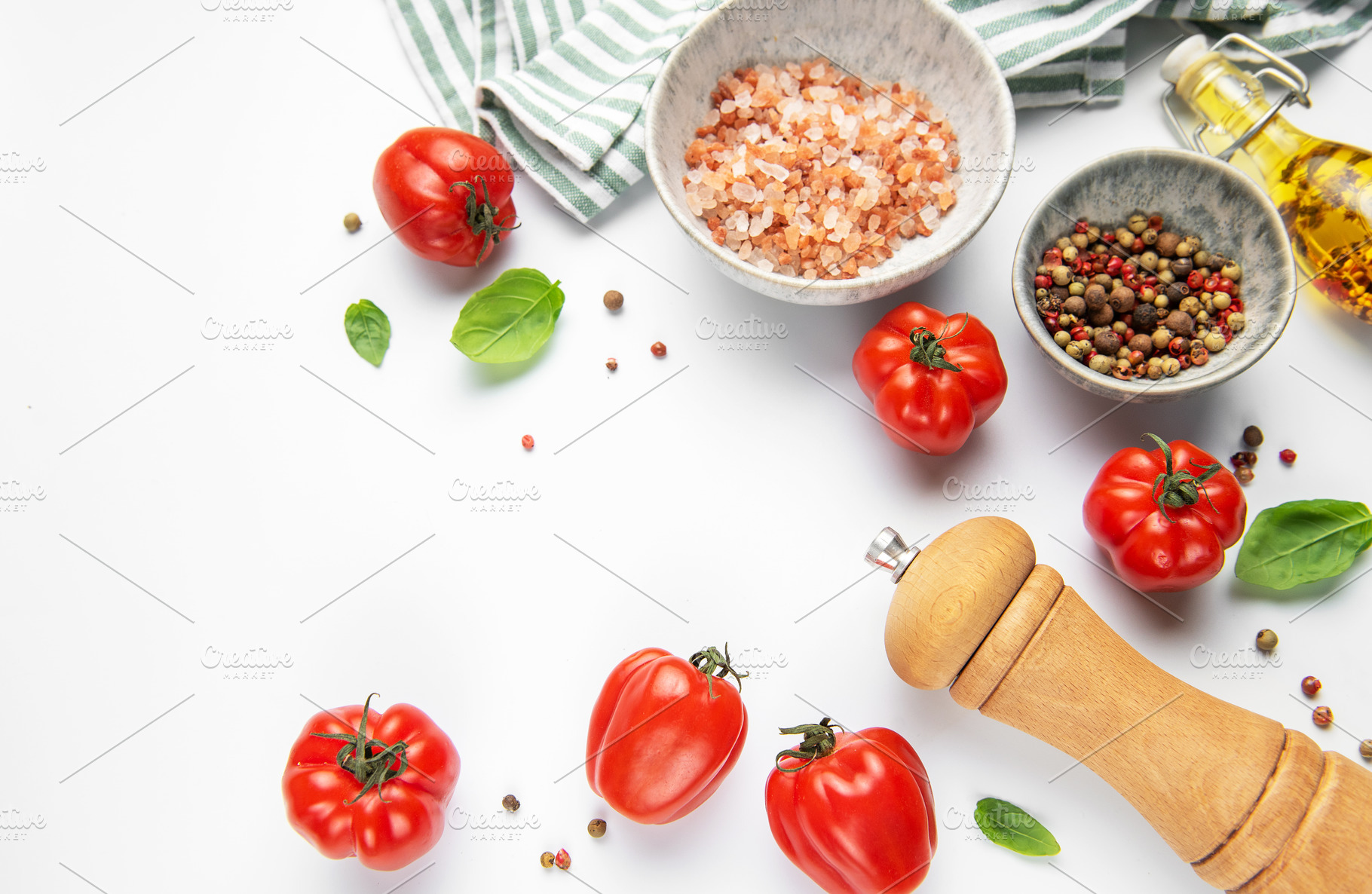 Fresh cooking ingredients with tomatoes, basil, pepper, and salt, a Photo by Olena Rudo