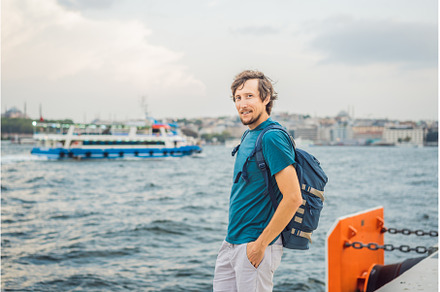 Man tourist enjoying Galataport area, an Architecture Photo by Elizaveta Galitskaya