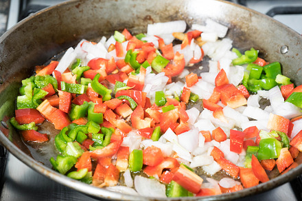 Preparation step of chicken paella containing arroz, asian, and background