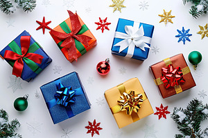Colorful christmas gift boxes with ribbon bows on white backgrou, a Holiday Photo by AlyaAnd