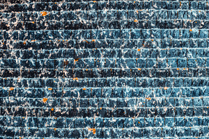 Water Cascading Over Blue Tiles, a Background Photo by SkyNext