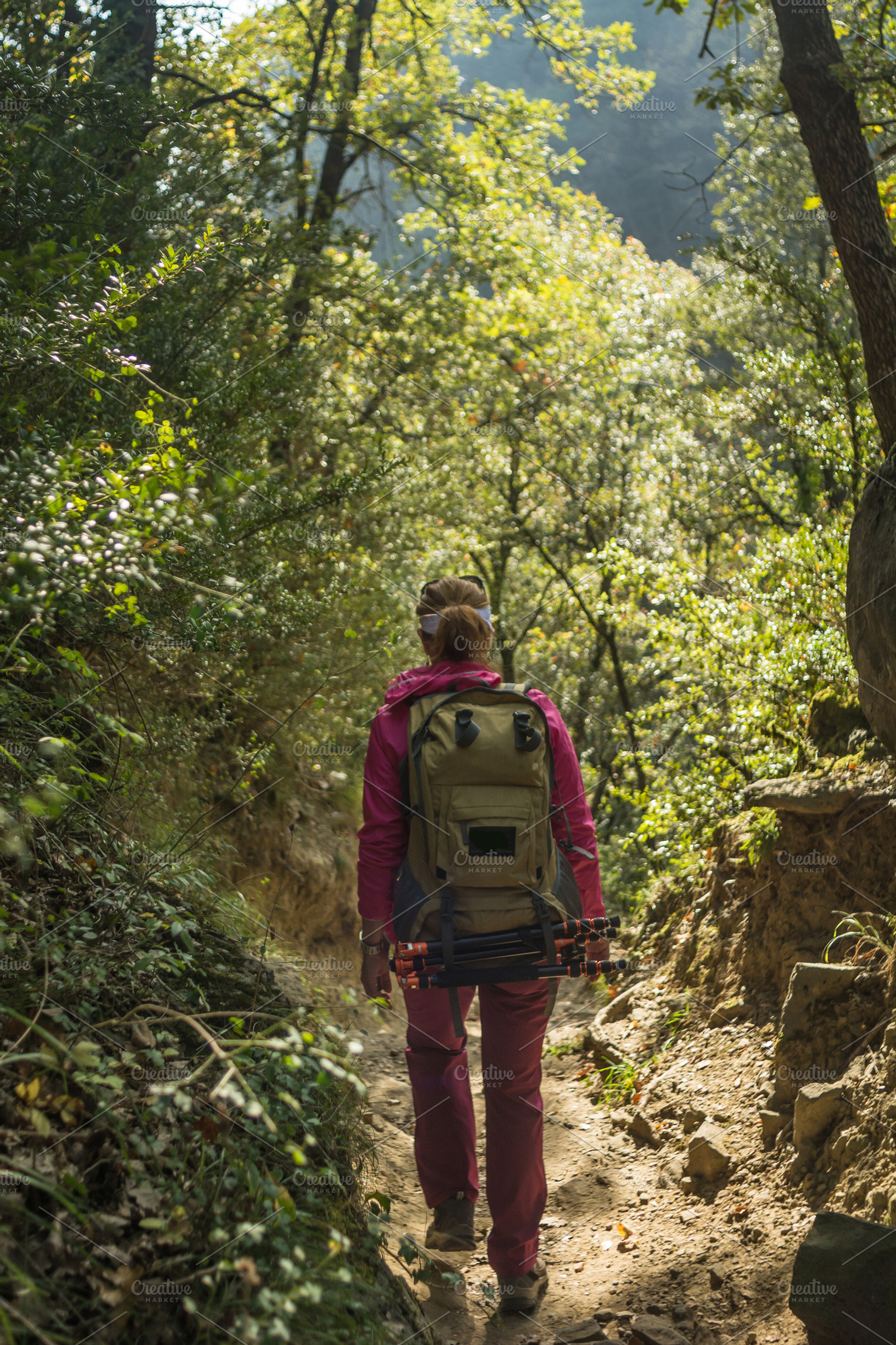 Trekking woman containing activity, adventure, and backpack, a Sports & Recreation Photo by expressiovisual