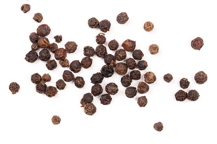 Black peppercorn isolated on white background top view containing peppercorn, a Food & Drink Photo by NataPhoto