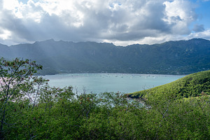 Taiohae Bay and town with anchored sailboats in Nuku Hiva, Marqu, a Nature Photo by GoodGoods