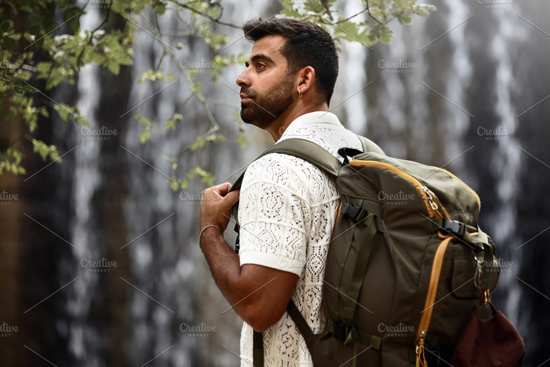 Portrait of a hiker with a backpack, a Person Photo by Perpis