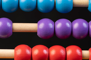 children's abacus for learning and development, close up, a Photo by rsoollAI