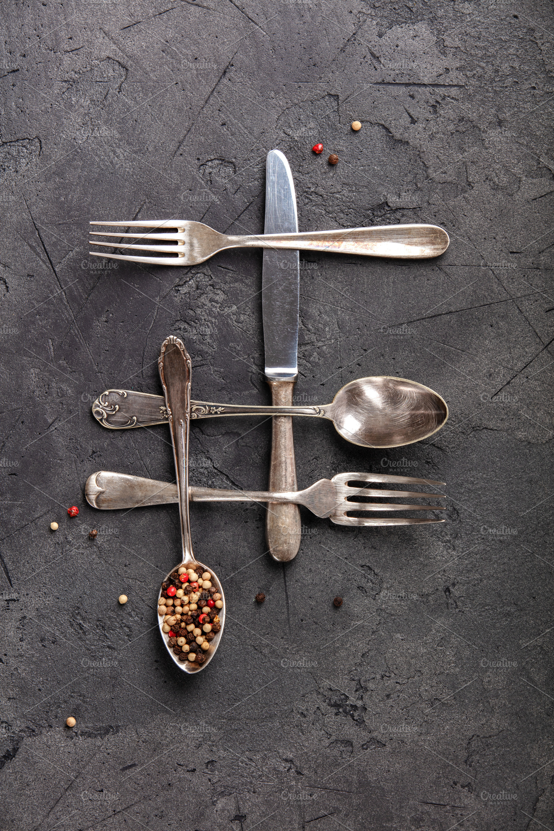 Vintage Cutlery Arranged as Hashtag Symbol with Peppercorns on D, a Food & Drink Photo by Natalia Klenova's Shop