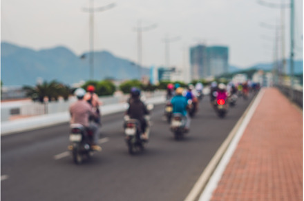 Blurred picture of motorcycles on, a Sports & Recreation Photo by Elizaveta Galitskaya