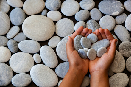 background of round stones, an Abstract Photo by Photostock