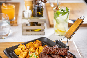 Enjoying a traditional romanian meal, a Photo by Grafvision photography