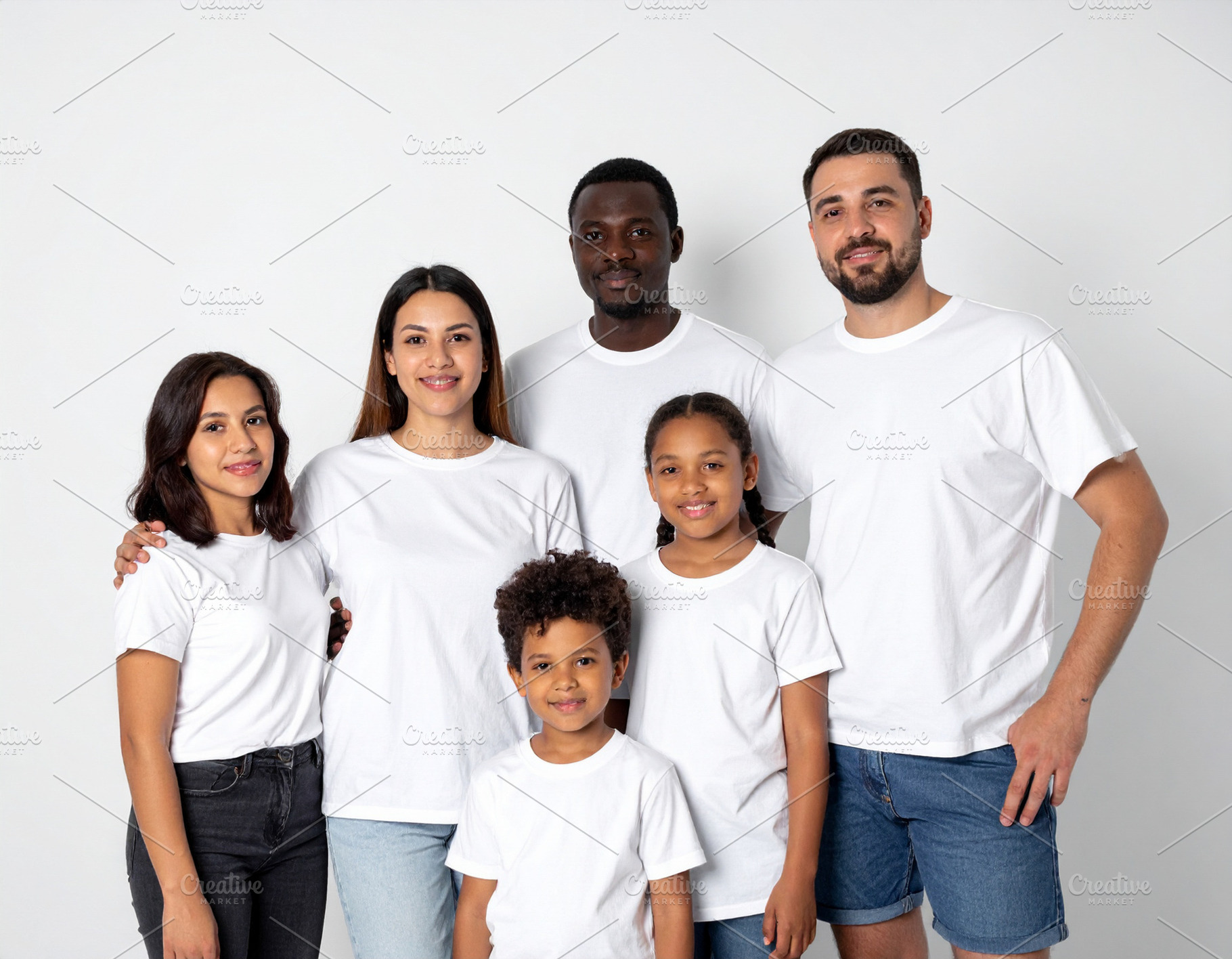 Diverse family standing together against a plain white backgroun, a Person Photo by DanFLCreativo