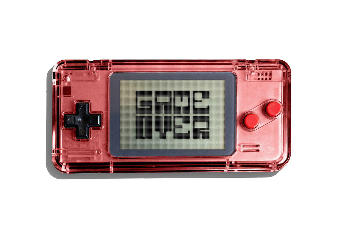 Retro Gaming Console Mockup, a Device Mockup by Design Squad (Photo 2 of 4)