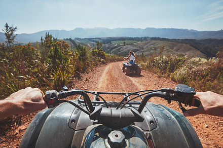 View from a quad bike in nature, a Person Photo by Jacob Lund