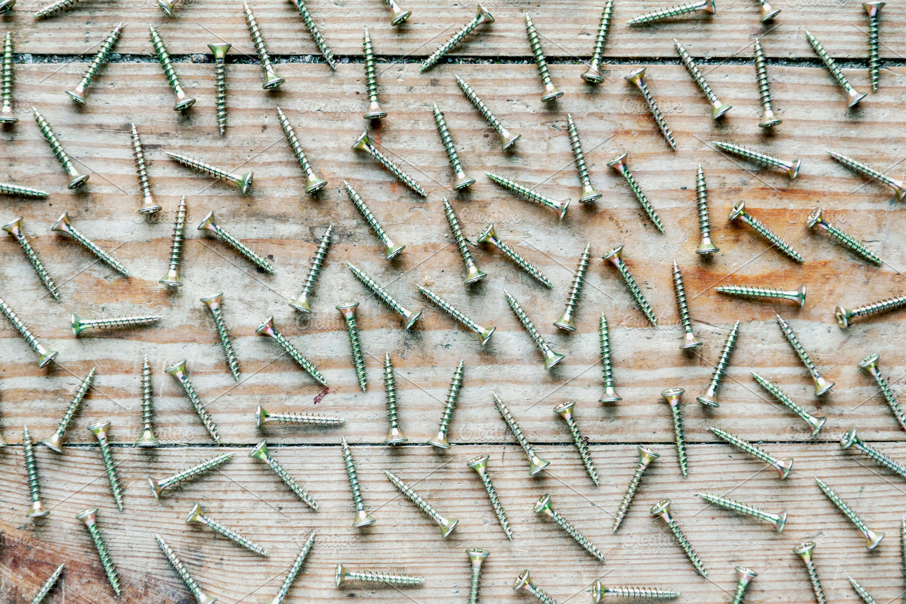Metal grunge screws flat lay, an Industrial Photo by BOOCYS