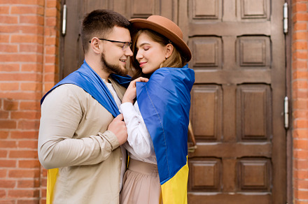 Young couple smiling flag Ukraine