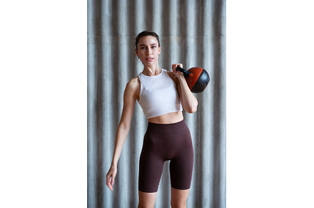 Portrait of a woman with kettlebell, a Sports & Recreation Photo by undrey