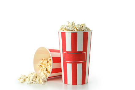 Cups with popcorn isolated on white background