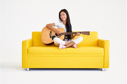 Smiling pretty female playing guitar, a Person Photo by Gladkov photography