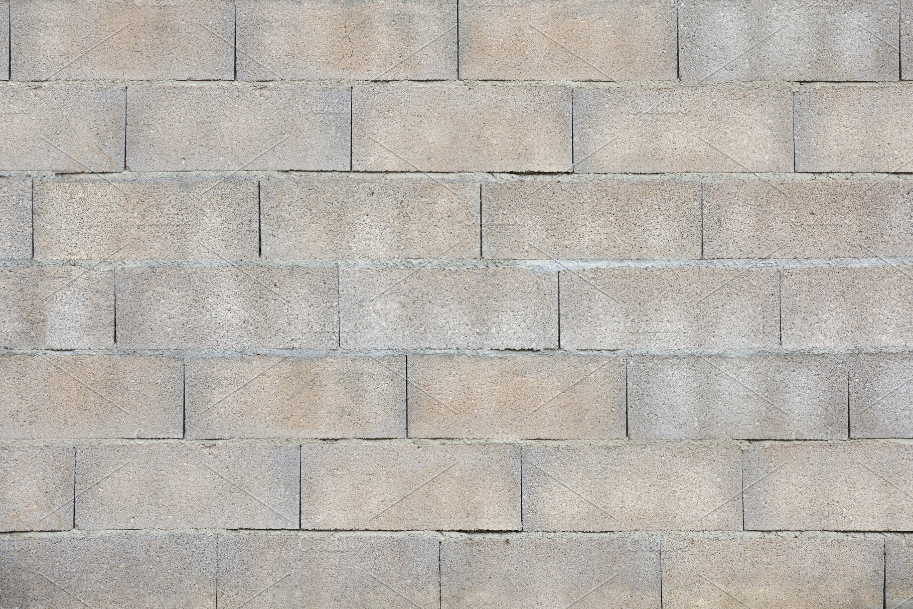 Gray concrete block wall, a Background Photo by Davizro's Market