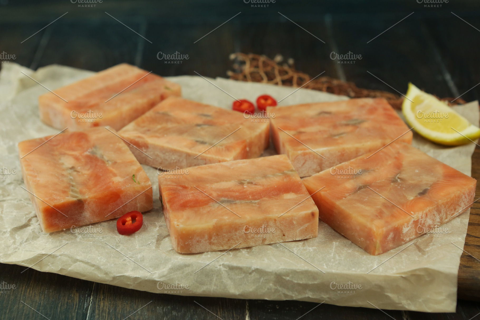 frosted salmon blocks close up photo, a Food & Drink Photo by Famapictura