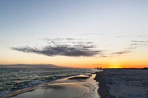 Sunset on a Florida Pensacola beach along the calm ocean with warm sky and gent, a Nature Photo by AS photostudio