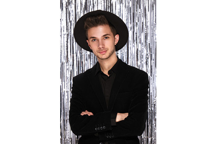 Young attractive man in a festive, a Beauty & Fashion Photo by KOBRIN|PHOTO