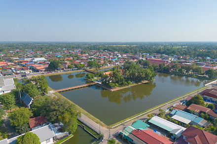 Aerial view of local residential neighborhood roofs. Urban housi
