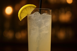 Tom Collins cocktail with lemon, generative AI, a Photo by Nito