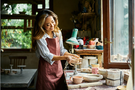 Female artist sculpts crafts with, an Arts & Entertainment Photo by Gladkov photography