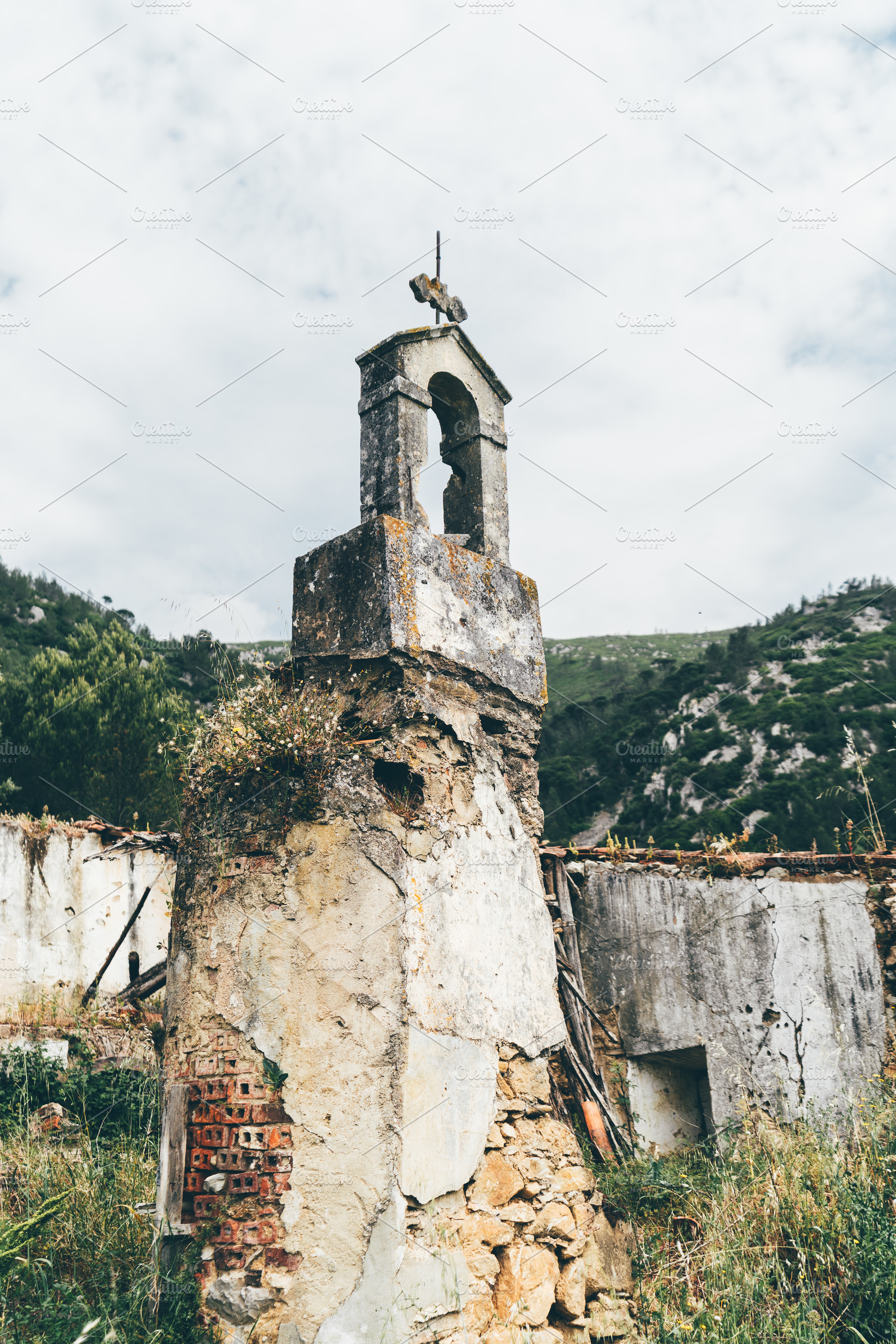 Ruined bell tower in mountain, an Architecture Photo by SkyNext