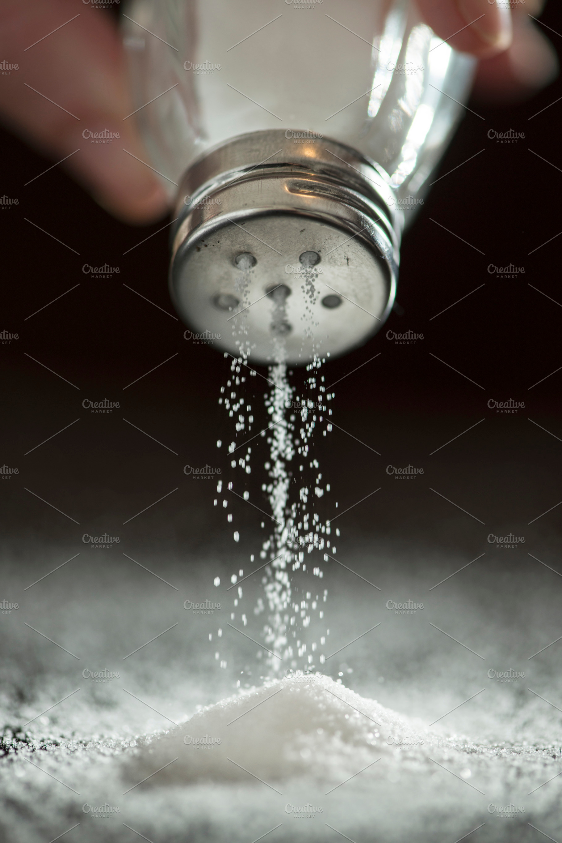 Spanners and white keyboard containing salt, adding, and hand, a Food & Drink Photo by DegImages
